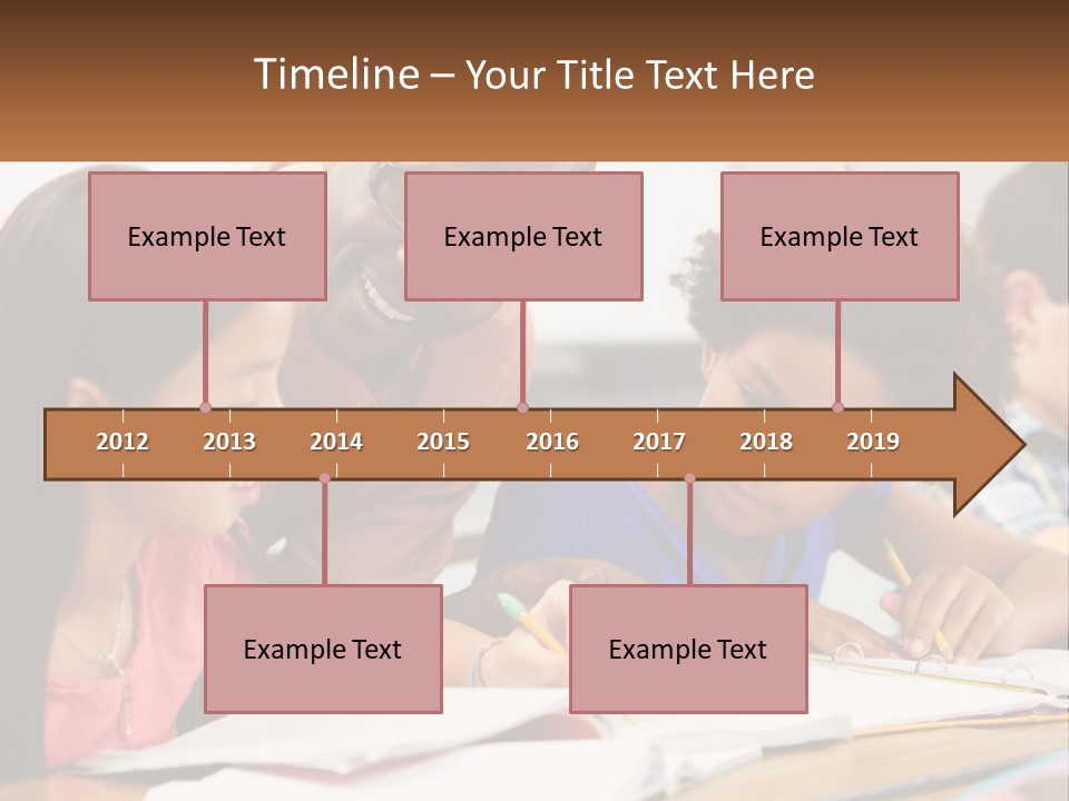 A Group Of Children Sitting At A Table Writing On Paper PowerPoint Template