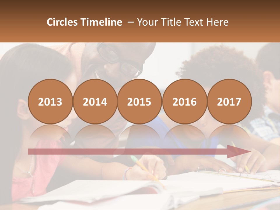 A Group Of Children Sitting At A Table Writing On Paper PowerPoint Template