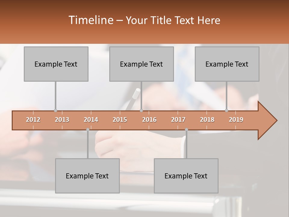 A Group Of People Writing On A Piece Of Paper PowerPoint Template