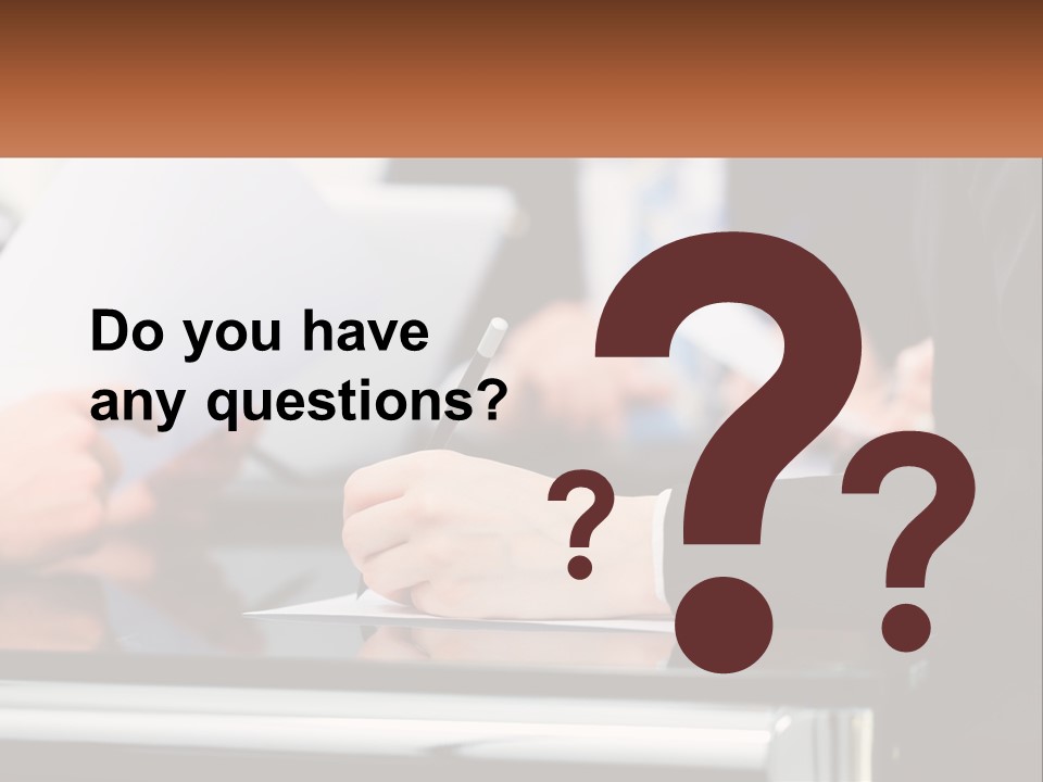 A Group Of People Writing On A Piece Of Paper PowerPoint Template