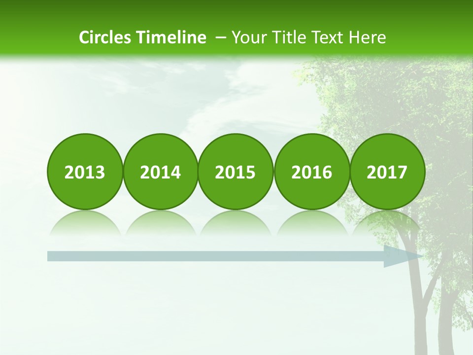 A Green Field With A Tree In The Middle Of It PowerPoint Template
