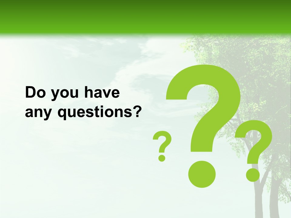 A Green Field With A Tree In The Middle Of It PowerPoint Template