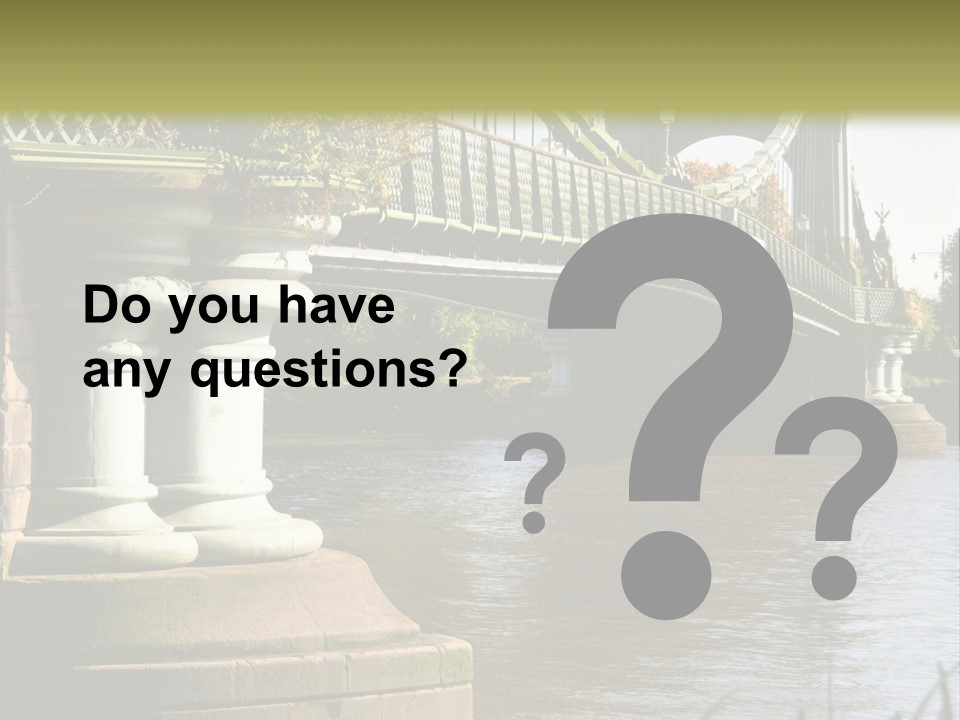 A Bridge Over A Body Of Water With A Building In The Background PowerPoint Template