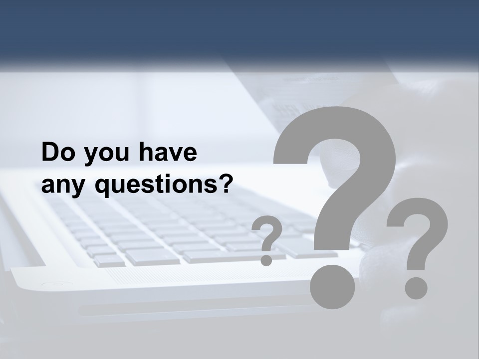 A Person Holding A Credit Card In Front Of A Laptop PowerPoint Template