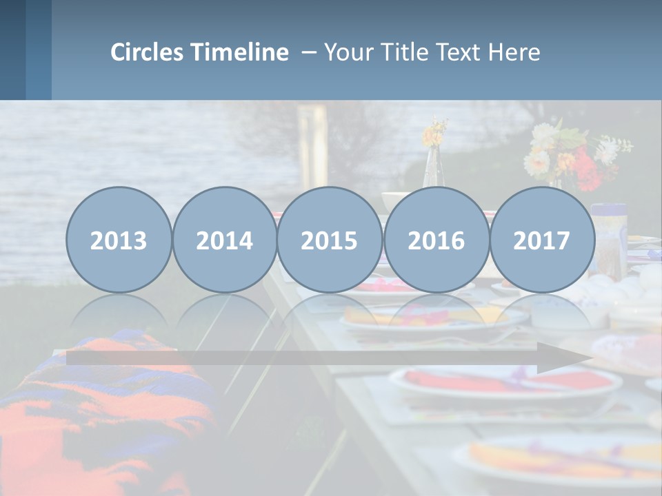 A Long Table With Plates On It With A Lake In The Background PowerPoint Template