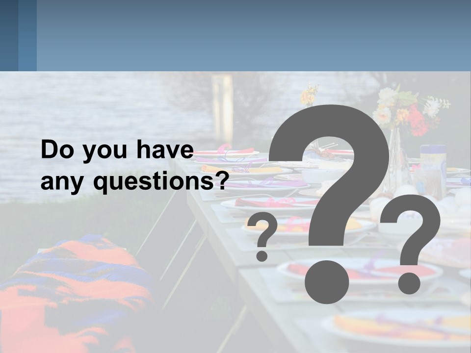 A Long Table With Plates On It With A Lake In The Background PowerPoint Template