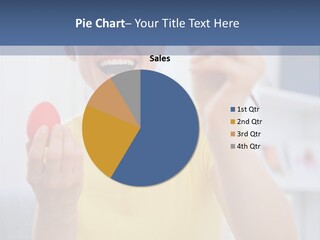 A Woman Holding A Piece Of Fruit In Her Hand PowerPoint Template