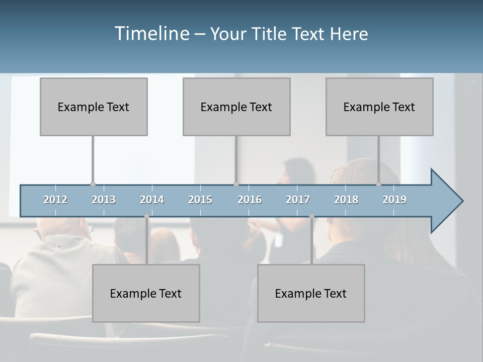 A Woman Giving A Presentation To A Group Of People PowerPoint Template