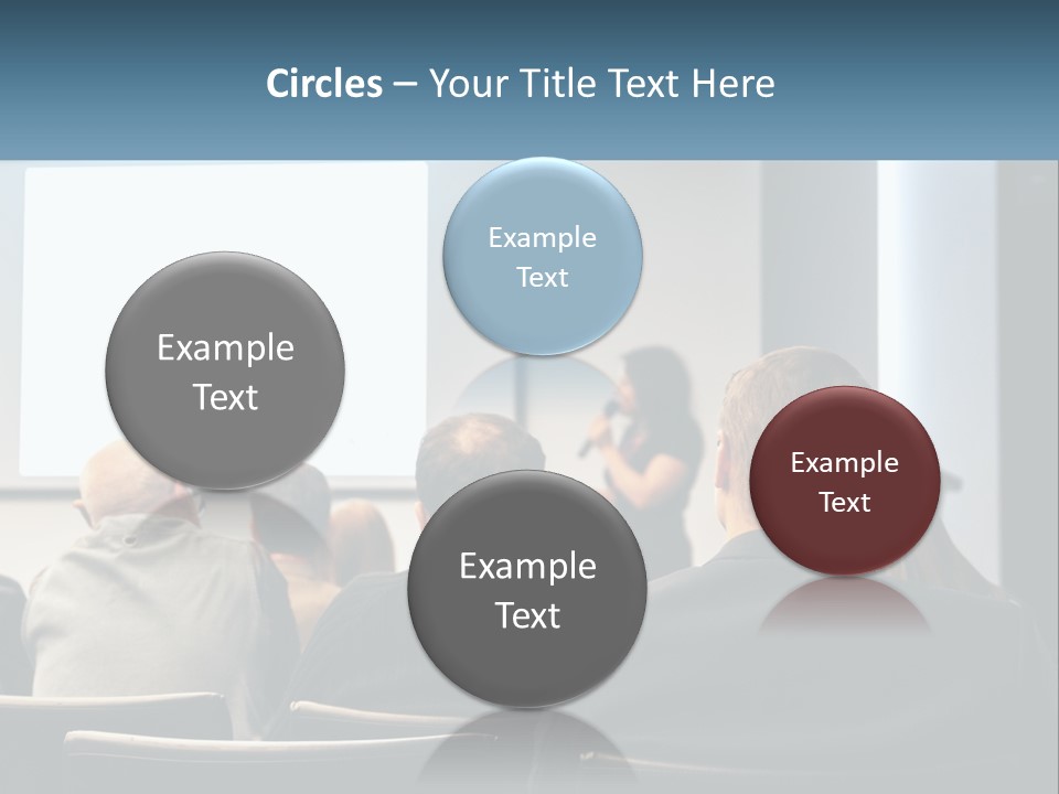 A Woman Giving A Presentation To A Group Of People PowerPoint Template