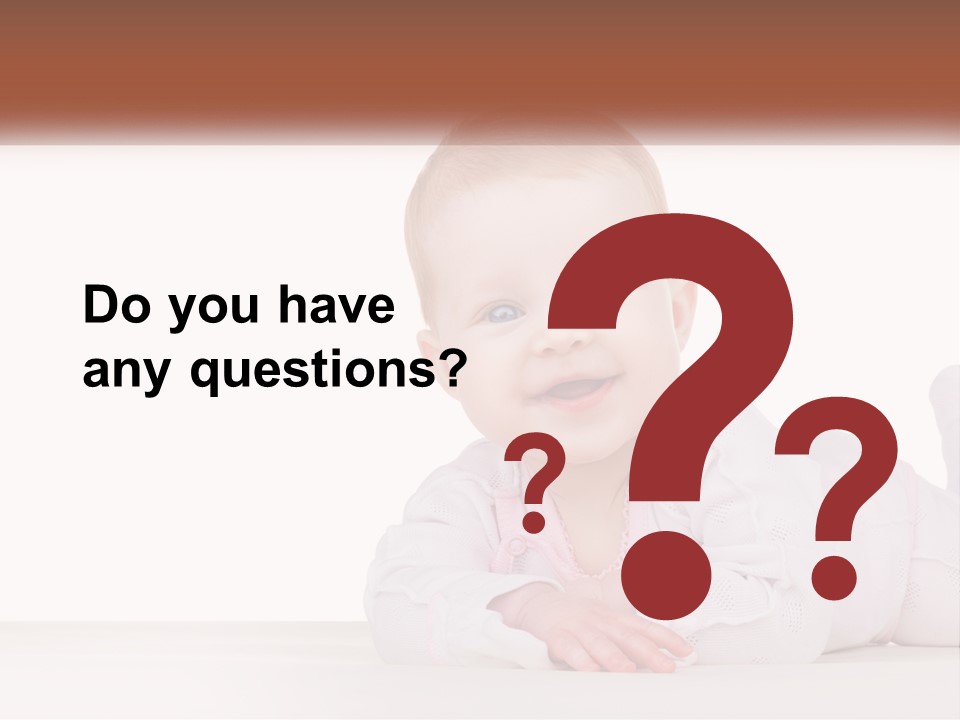 A Baby Is Laying Down On The Floor PowerPoint Template