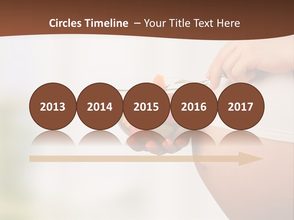 A Pregnant Woman Holding A Bowl Of Vegetables PowerPoint Template