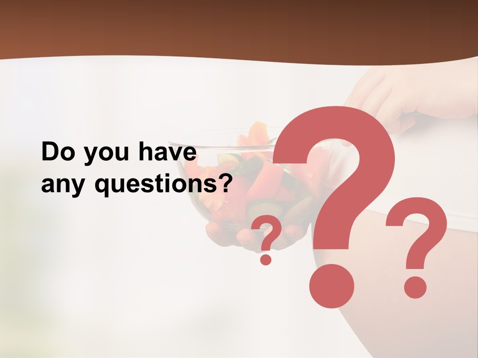 A Pregnant Woman Holding A Bowl Of Vegetables PowerPoint Template