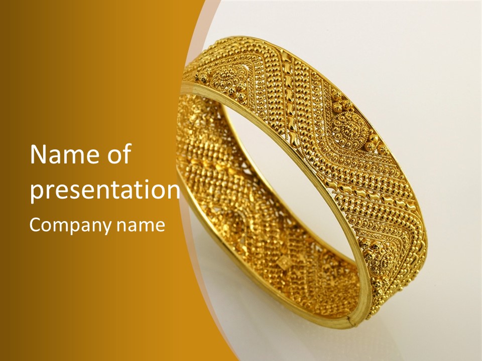 A Gold Bracelet On A White Surface With A Gold Background PowerPoint Template