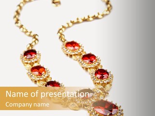 A Gold Necklace With Red Stones On A White Background PowerPoint Template