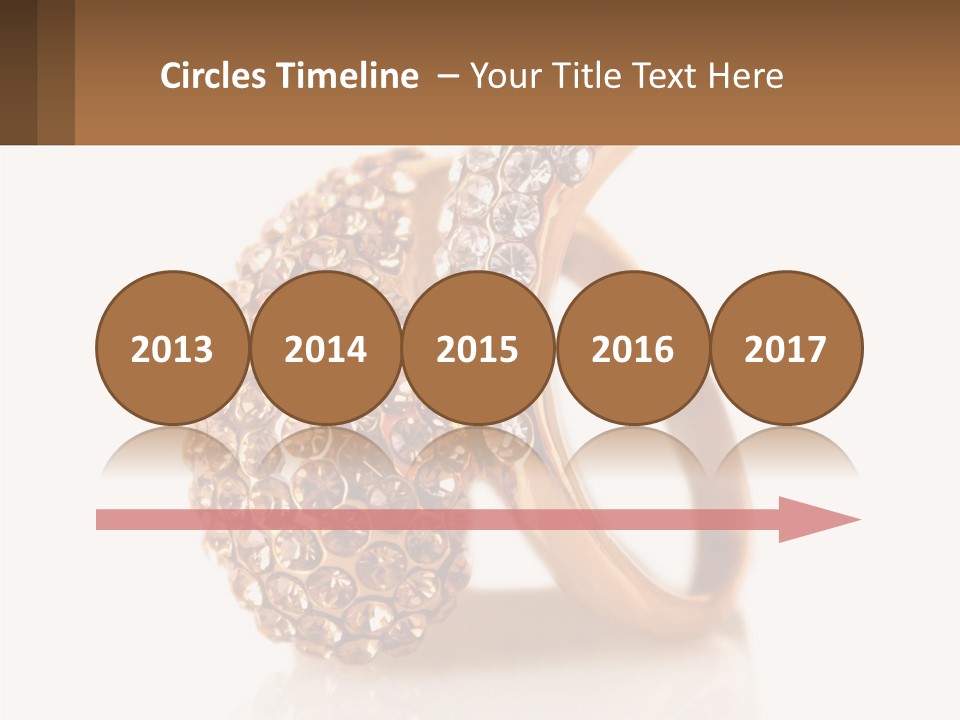 Two Gold Rings With Diamonds On A White Background PowerPoint Template
