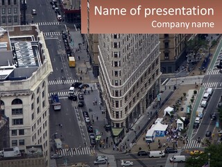 An Aerial View Of A City Street With Buildings PowerPoint Template