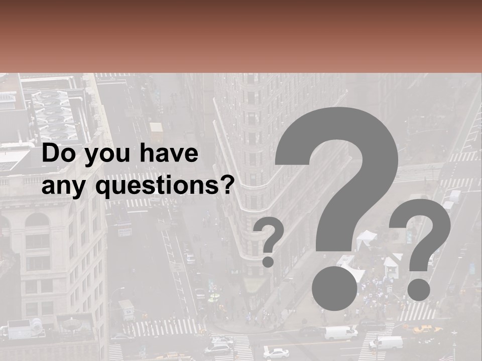 An Aerial View Of A City Street With Buildings PowerPoint Template