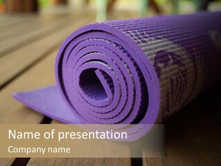 A Purple Yoga Mat On A Wooden Table PowerPoint Template