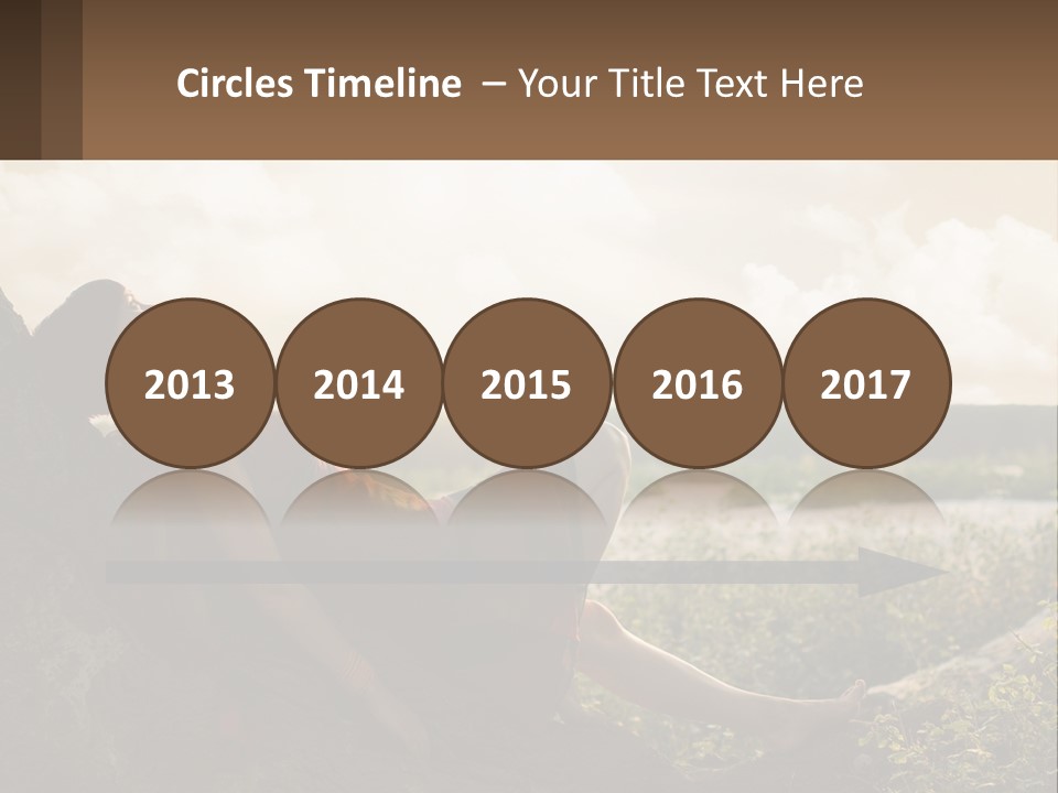 A Woman Sitting On A Tree In A Field PowerPoint Template