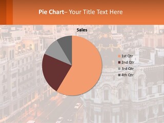 An Aerial View Of A City At Sunset PowerPoint Template