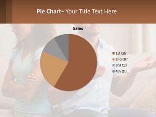 A Man And Woman Sitting On A Couch Talking PowerPoint Template
