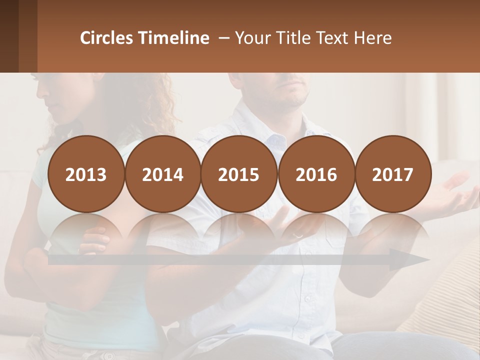 A Man And Woman Sitting On A Couch Talking PowerPoint Template