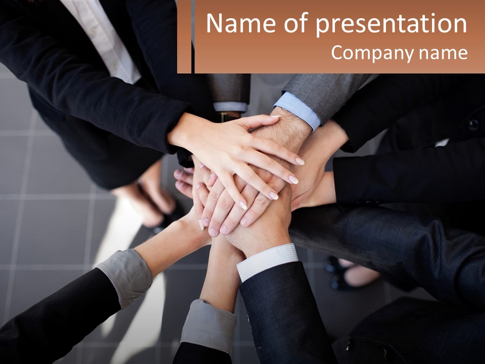 A Group Of Business People Stacking Their Hands Together PowerPoint Template