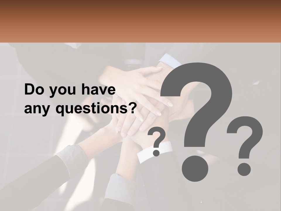 A Group Of Business People Stacking Their Hands Together PowerPoint Template