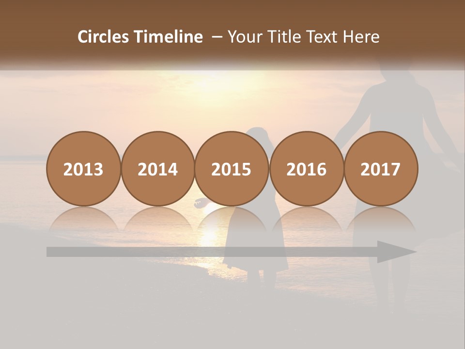 A Mother And Daughter Holding Hands On The Beach At Sunset PowerPoint Template