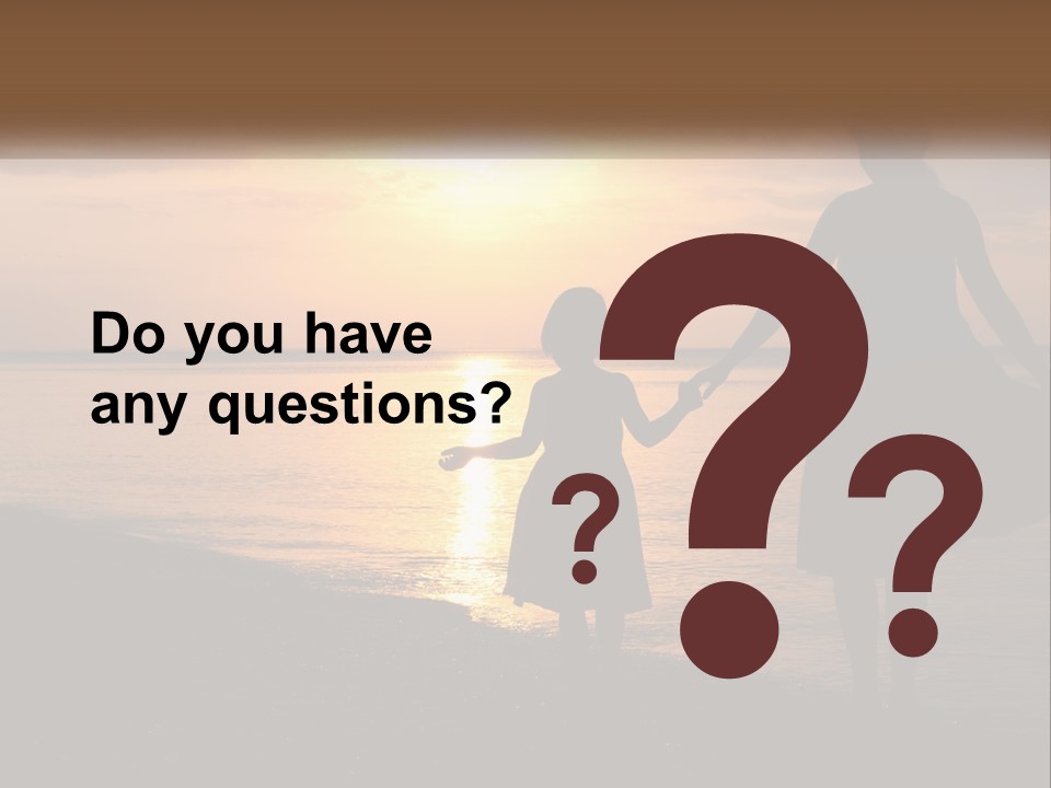 A Mother And Daughter Holding Hands On The Beach At Sunset PowerPoint Template