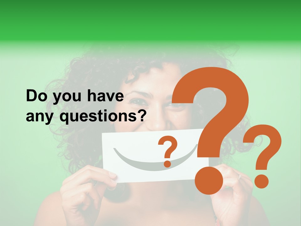 A Woman Holding A Card With A Smiley Face On It PowerPoint Template