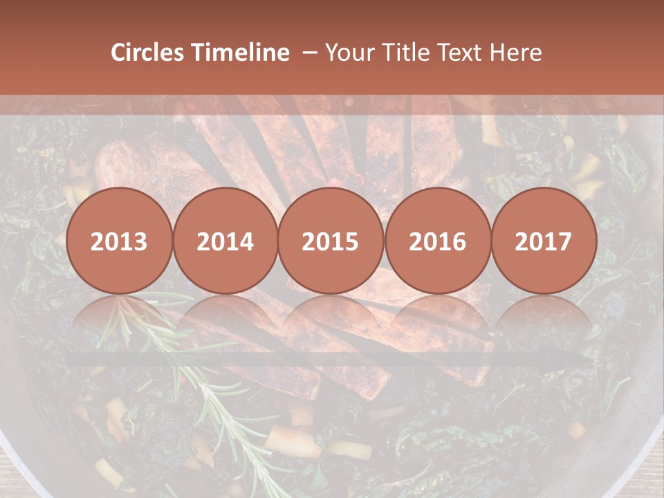 A Pan Filled With Meat And Greens On Top Of A Wooden Table PowerPoint Template