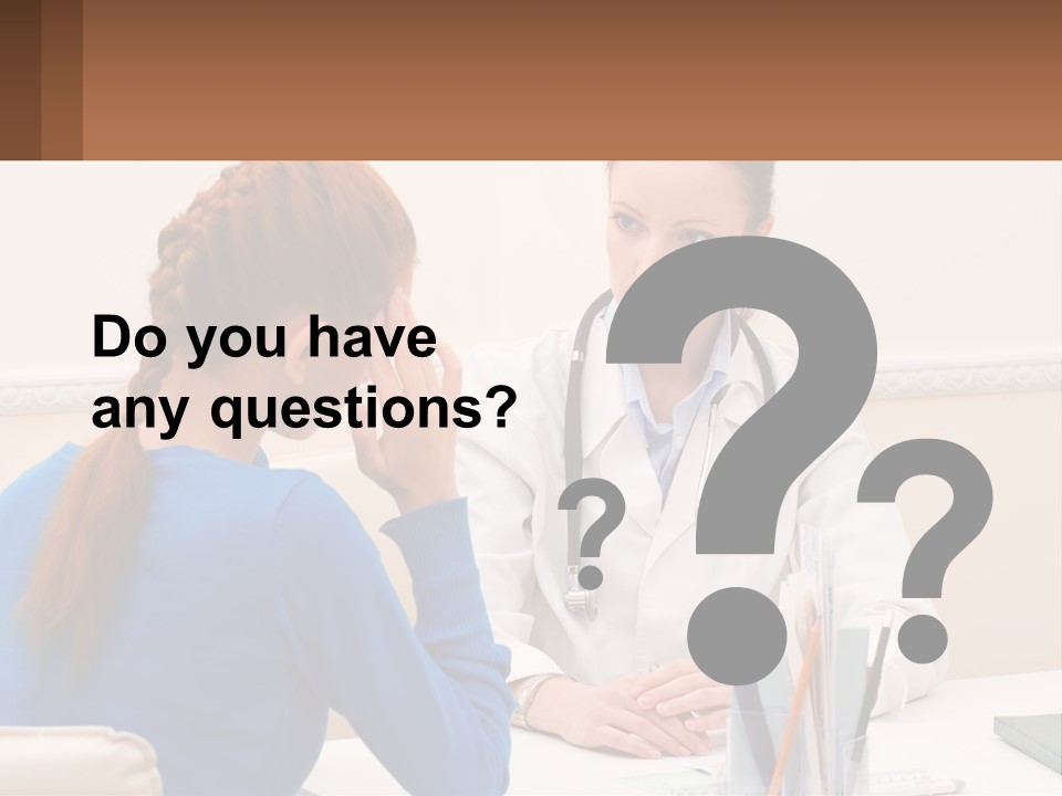 A Doctor Talking To A Patient At A Desk PowerPoint Template
