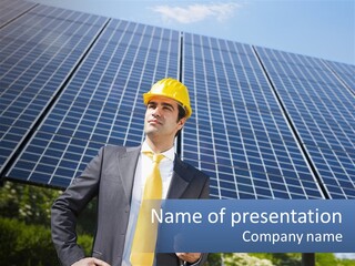 A Man Wearing A Hard Hat Standing In Front Of A Solar Panel PowerPoint Template