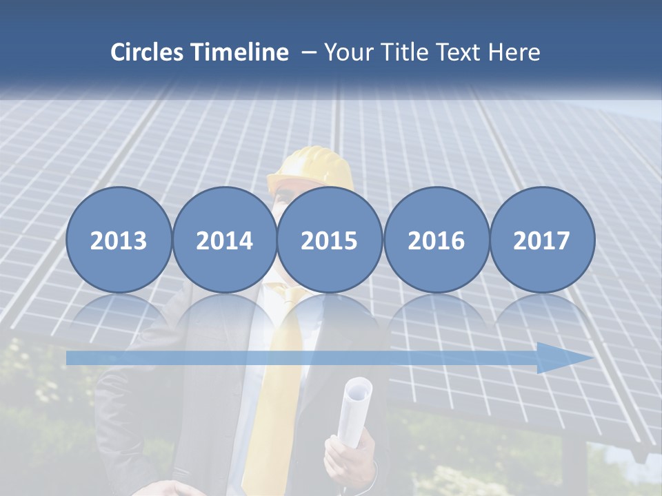 A Man Wearing A Hard Hat Standing In Front Of A Solar Panel PowerPoint Template