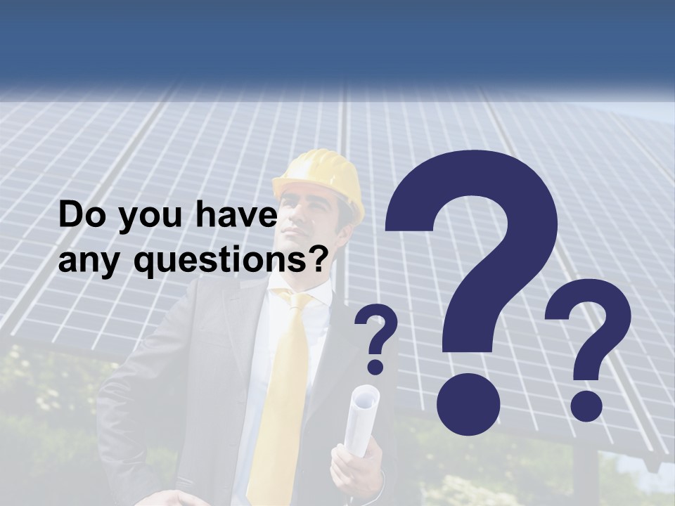 A Man Wearing A Hard Hat Standing In Front Of A Solar Panel PowerPoint Template
