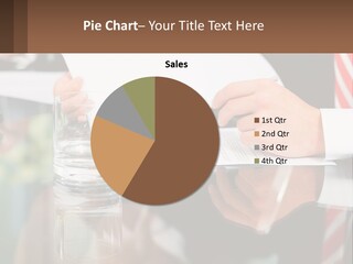 A Man In A Suit Writing On A Piece Of Paper PowerPoint Template