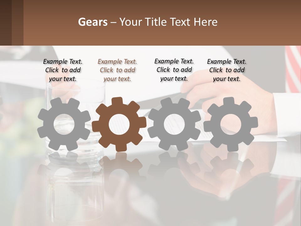 A Man In A Suit Writing On A Piece Of Paper PowerPoint Template