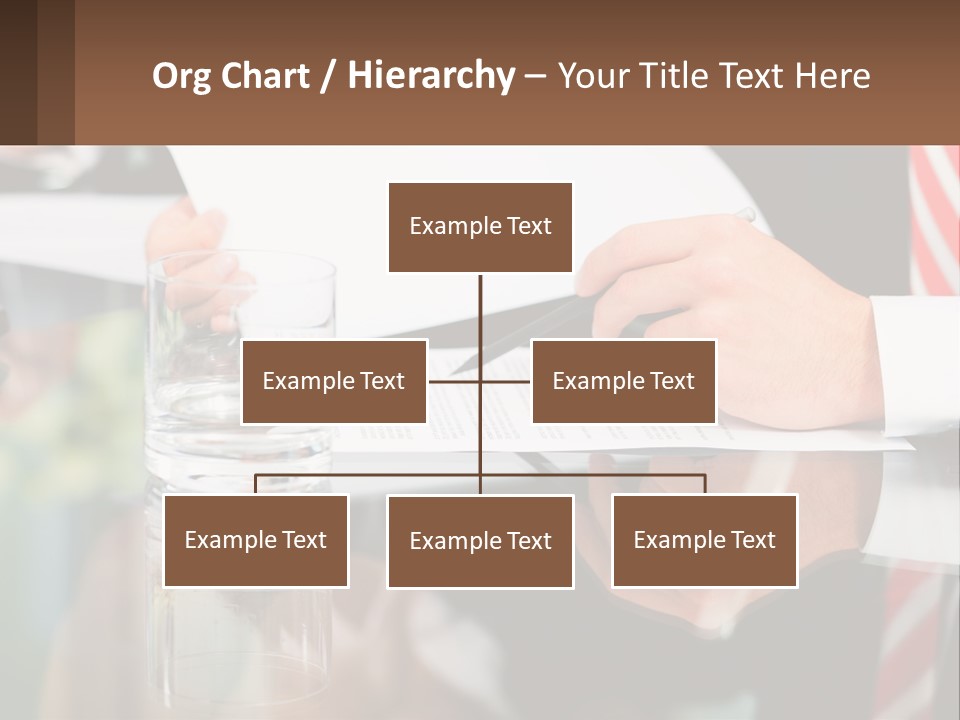 A Man In A Suit Writing On A Piece Of Paper PowerPoint Template