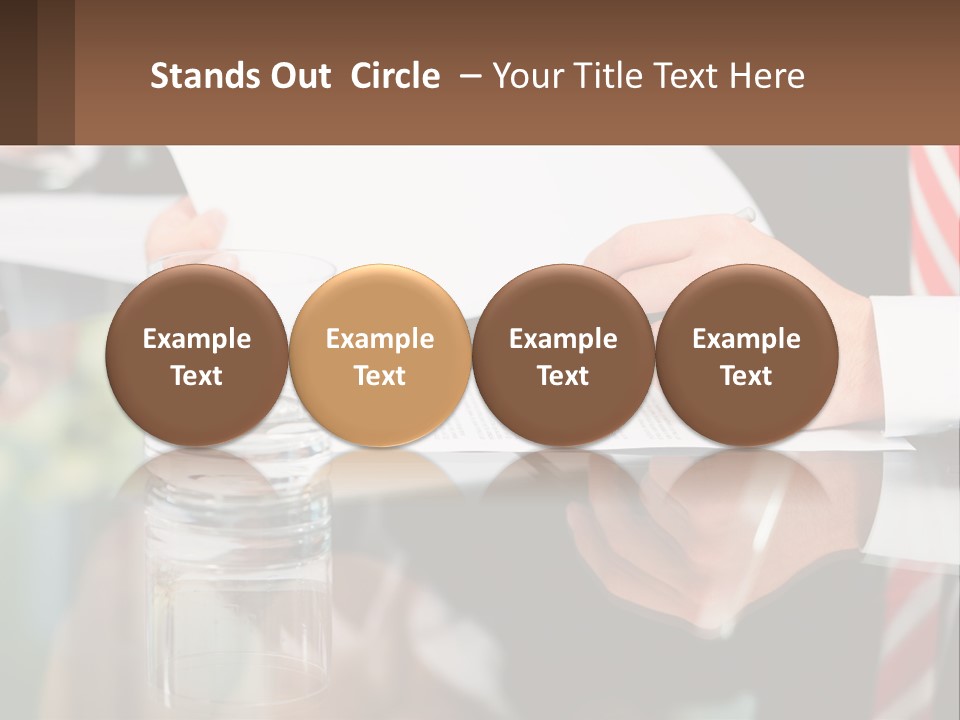 A Man In A Suit Writing On A Piece Of Paper PowerPoint Template