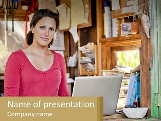 A Woman Sitting In Front Of A Laptop Computer PowerPoint Template