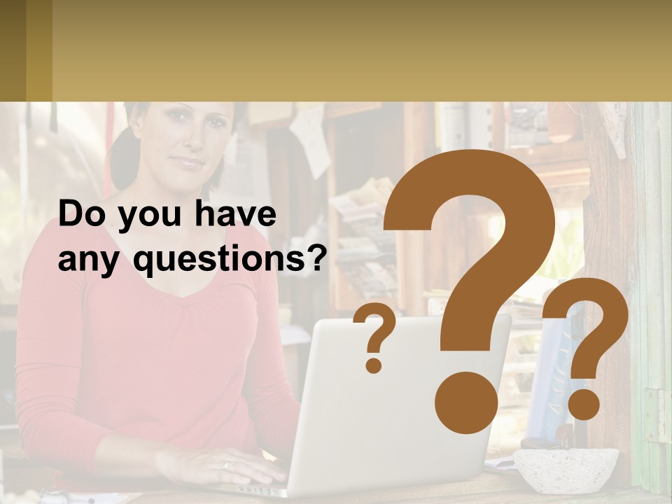 A Woman Sitting In Front Of A Laptop Computer PowerPoint Template