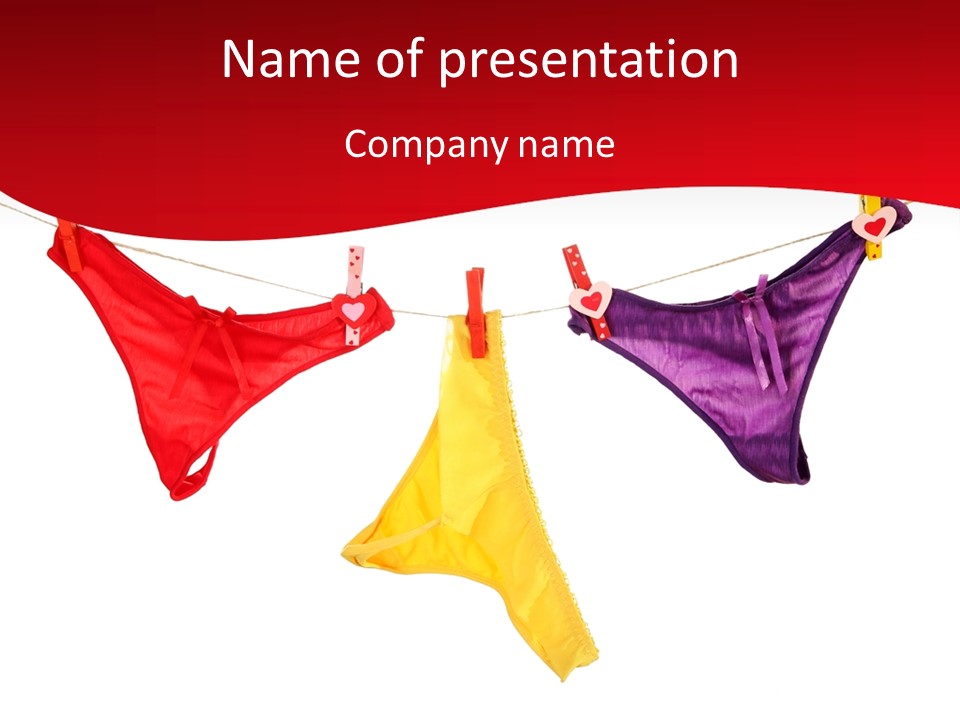 A Group Of Clothes Hanging On A Clothes Line PowerPoint Template