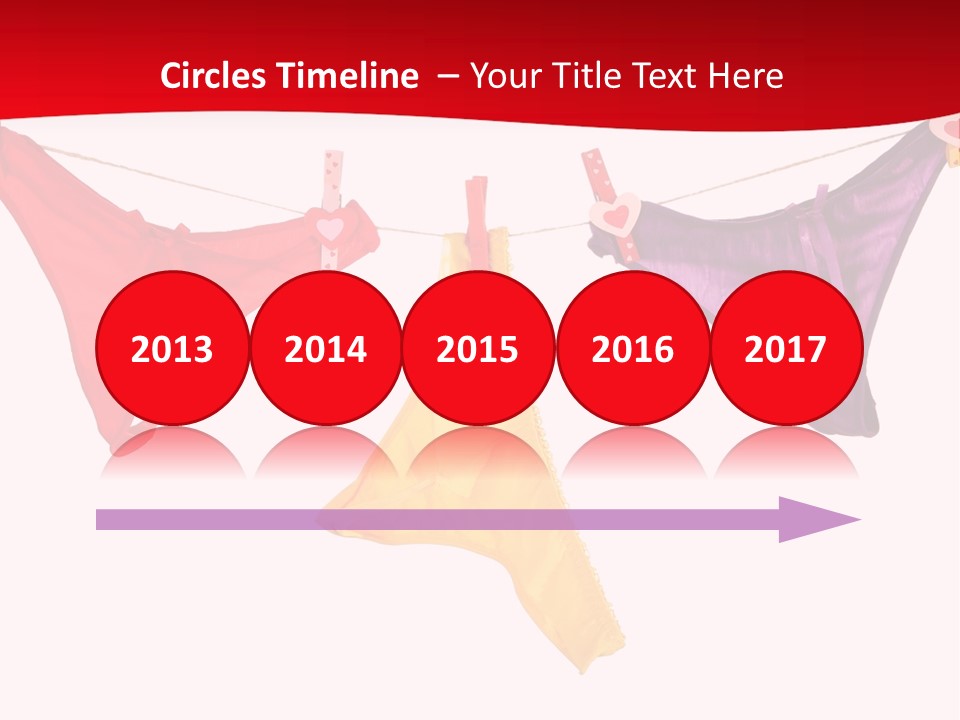 A Group Of Clothes Hanging On A Clothes Line PowerPoint Template