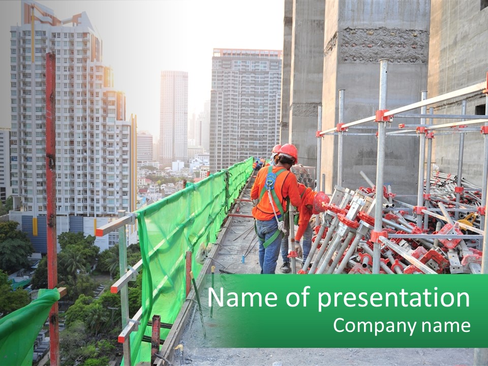 A Construction Worker On Top Of A Building PowerPoint Template