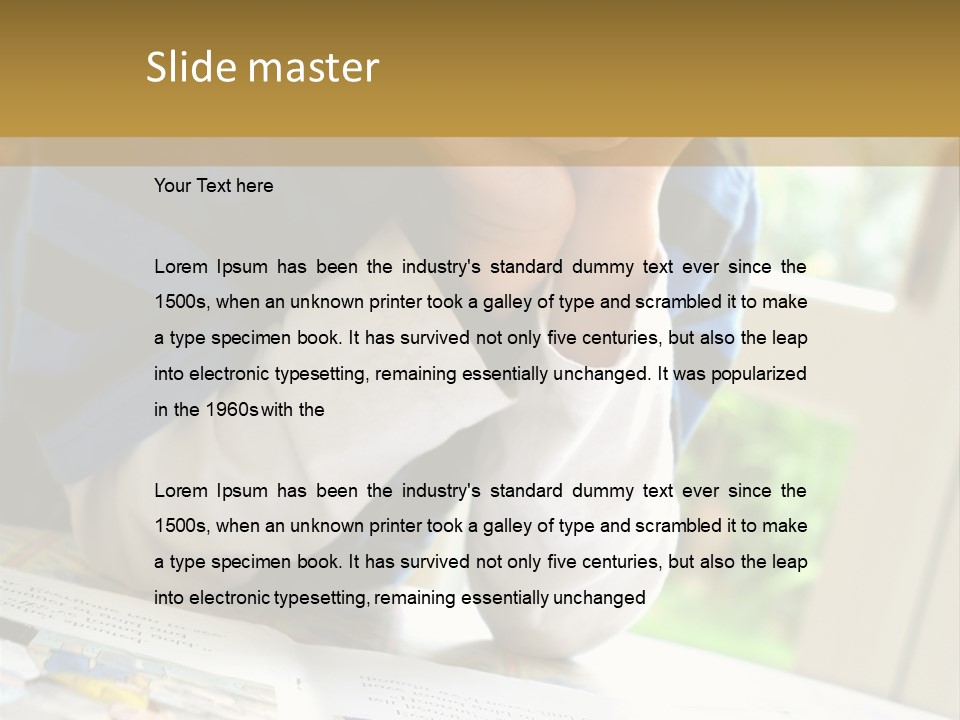 A Young Boy Reading A Book On Top Of A Table PowerPoint Template