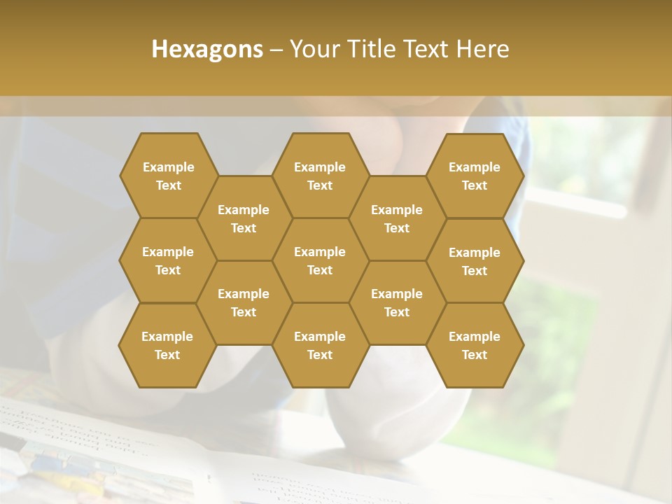 A Young Boy Reading A Book On Top Of A Table PowerPoint Template
