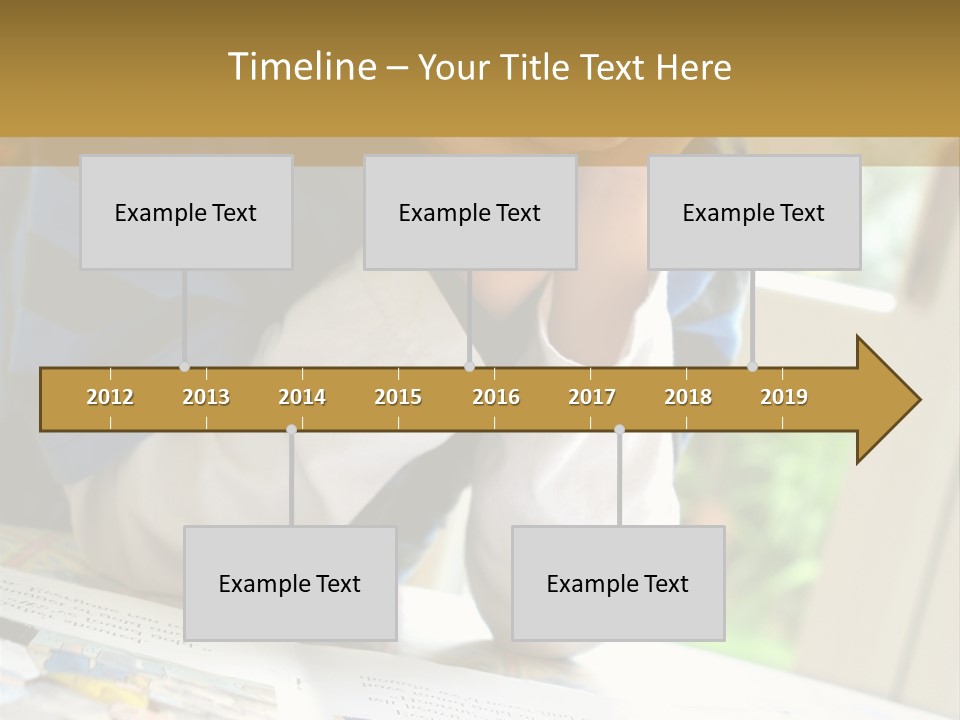 A Young Boy Reading A Book On Top Of A Table PowerPoint Template