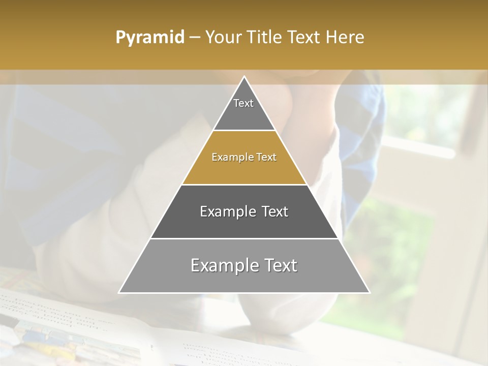 A Young Boy Reading A Book On Top Of A Table PowerPoint Template