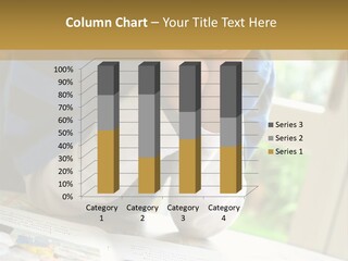A Young Boy Reading A Book On Top Of A Table PowerPoint Template